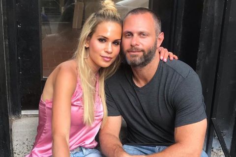 Jackie Goldschneider in pink top with her husband Evan Goldschneider.